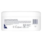 Dove krémtusfürdő peeling makadámia és rizstej, 4 darabos, 4 x 225 ml - outlet termék