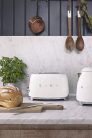 Smeg TSF01CREU kenyérpirító (2 szeletes, 6 fokozat, melegítő, kiolvasztó, bagel funkció, morzsatálca, 950W, krém)
